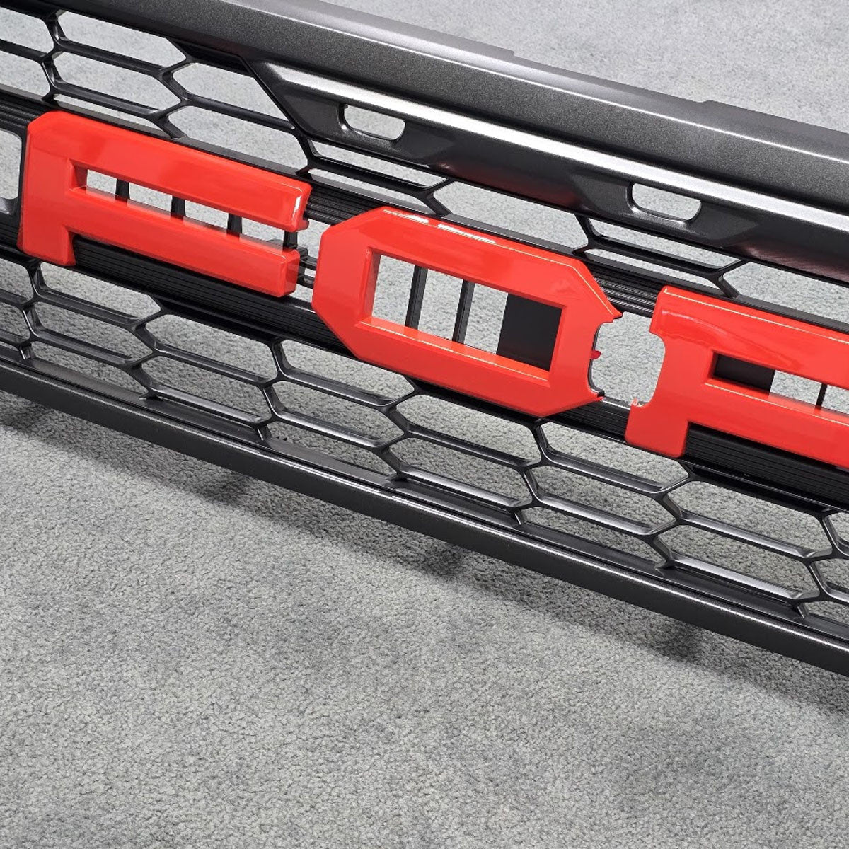 AMP-83684-03 Code Orange Grille Lettters for Raptor Bronco 
( Incredible 2 Stage Painted Finish!)