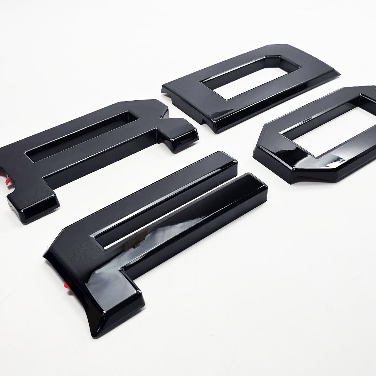 AMP-83684-07 Shadow Black Grille Lettters for Raptor Bronco 
( Incredible 2 Stage Painted Finish!)