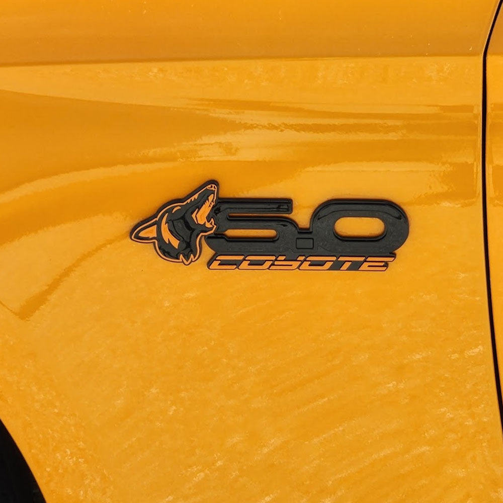 2015-2023 Coyote 5.0 Mustang Fender Emblems (BLACK/FURY ORANGE) AMP-85101-54