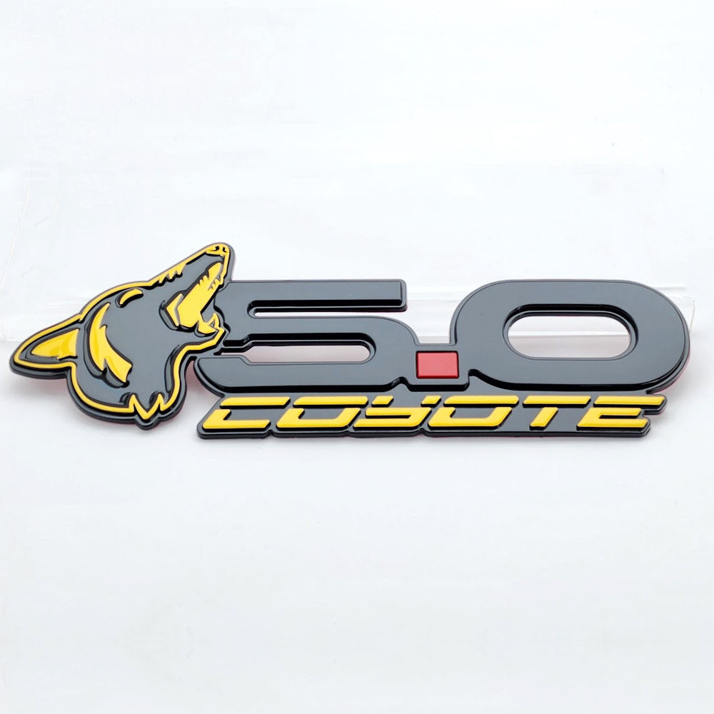 Howling Coyote 5.0 Rear Decklid Emblem Installed - Triple Yellow - Fits Mustang & Universal - AMP-85101-77