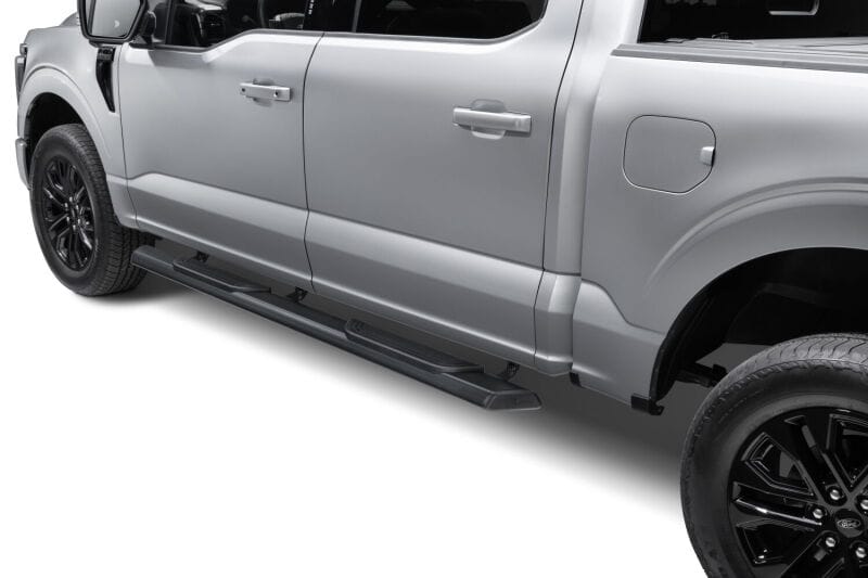 RealTruck 15-26 Ford F150 Super Crew / 17-26 F250/F350 SD Super Cab Traxio 4in Nerf Bars - Tex. Blk